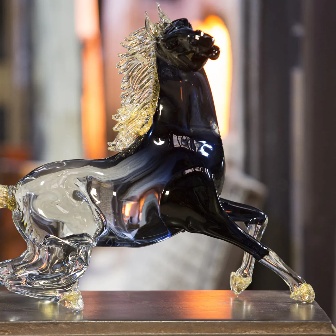 Zanetti Murano Piccolo cavallo seduto in vetro nero> Statuine