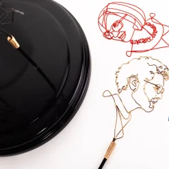 Profilo Statuetta della famiglia Cloche><noscript><img width=